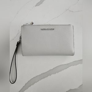 Michael Kors light grey smartphone wristlet